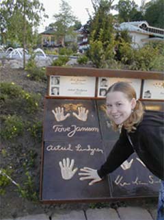 Emily in Astrid's handprints