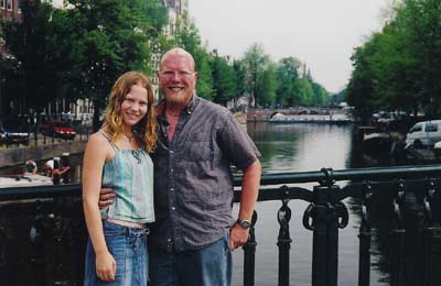 Us by a canal in Amsterdam